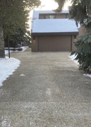 The same driveway cleared of snow