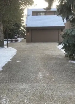 The same driveway cleared of snow